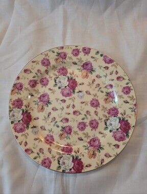 This is a Gracie China by Coastline Imports Cream Rose Chintz Dessert Plate 8 In